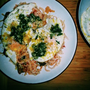 eggplant pasta with fried egg, salsa verde, and panko bread crumbs