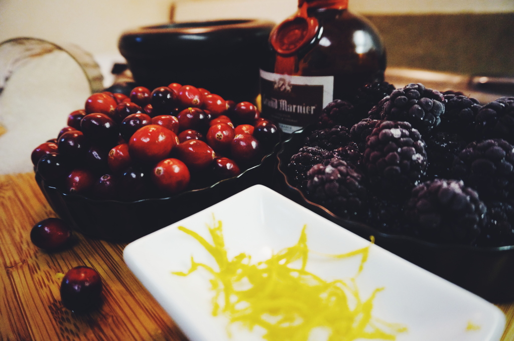 Some cranberries, lemon zest, Grand Marnier, blackberries... Oh, and some Hibiscus petals. Just because.