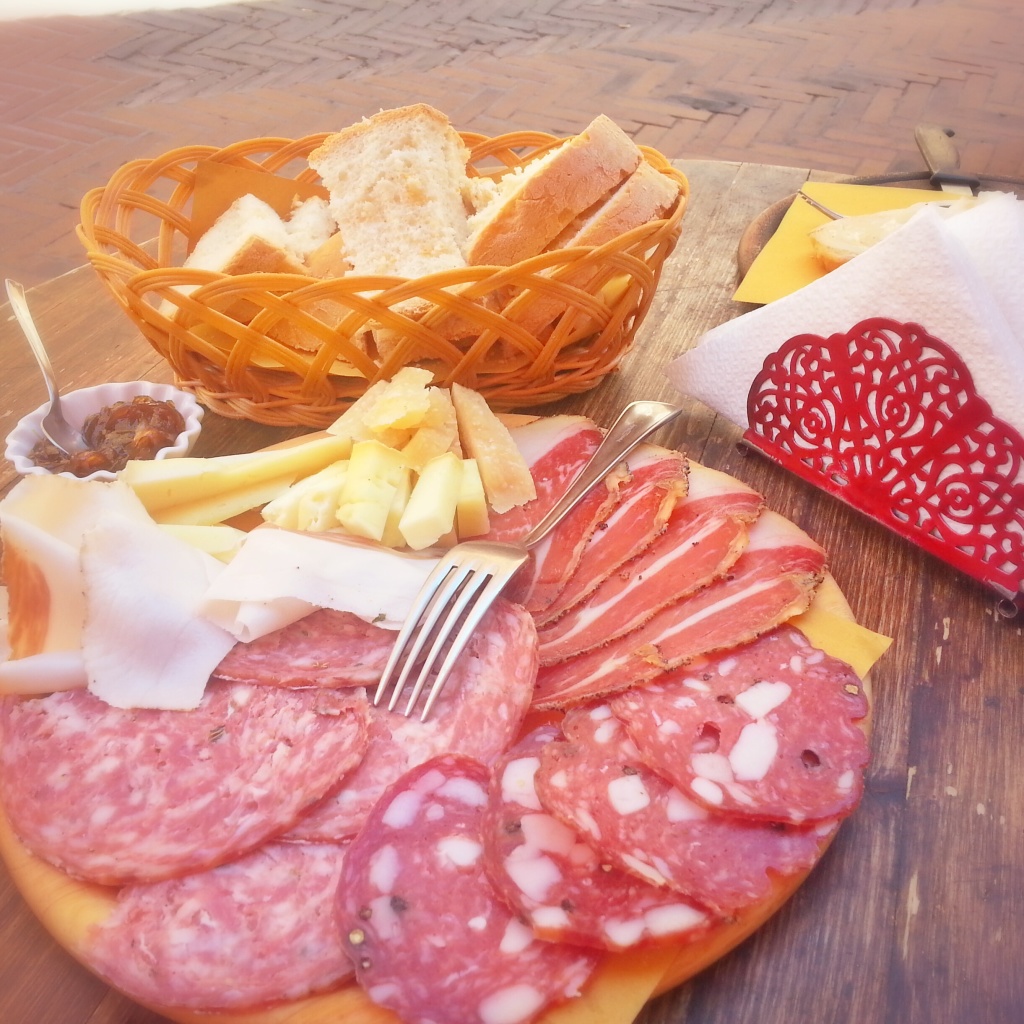 A Tuscan meal of cured meats, cheese, bread and little else