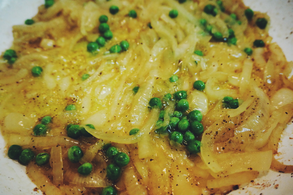 Caramelized Onions and Peas - cooking up in rendered bacon fat.  Come to think of it, just this would be delish in a omelet too.
