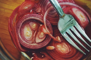 Pickled red onion, gives it a little extra kick