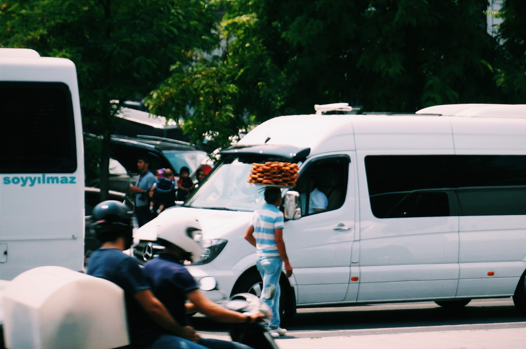 Look, no hands! This guy's job description included stellar balance.... Selling Simit (a Turkish bagel with sesame seeds) in the street.