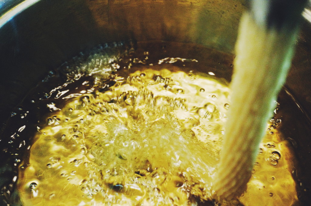 Piping churros into hot oil