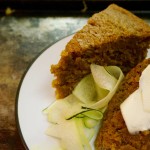 This Simple Pumpkin Zucchini Bread makes use of Pumpkin Stout for extra flavor, moisture and to replace the eggs. That makes this bread both Vegan & Dairy-Free! It is so sweet it could almost double as a cake | Suitcase Foodist